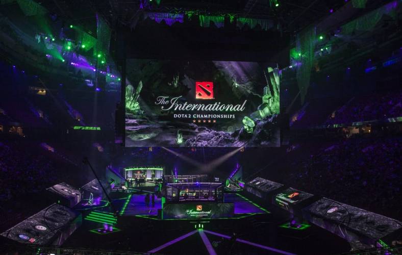 Aug 25, 2018; Vancouver, British Columbia, CAN; Fans watch as Team Evil Geniuses  plays Team LGD in the lower bracket final of the International Dota 2 Championships at Rogers Arena in Vancouver.  The championships are eSports largest annual tournament with approximately $25 million U.S. in prize money to be awarded.  Dota 2 is a free 10-player online video game with two teams of players from all over the world competing against one another in each game. Mandatory Credit: Bob Frid-USA TODAY Sports