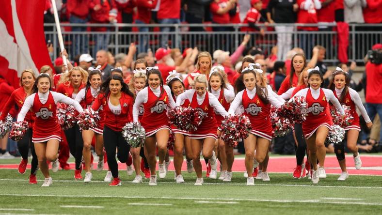 Sep 22, 2018; Columbus, OH, USA; Ohio State Buckeyes cheerleaders take the field before the game against the Tulane Green Wave at Ohio Stadium. Mandatory Credit: Joe Maiorana-USA TODAY Sports