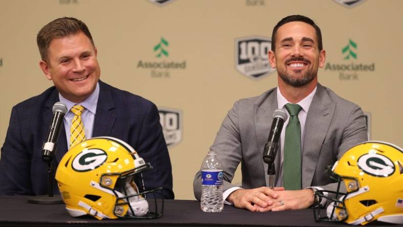 Green Bay Packers general manager Brian Gutekunst (left) laughs with new Packers head coach Matt LaFleur at his introductory press conference in the Lambeau Field media auditorium.

Green Bay Packers general manager Brian Gutekunst (left) laughs with new Packers head coach Matt LaFleur at his introductory press conference in the Lambeau Field media auditorium..

LAFLUER