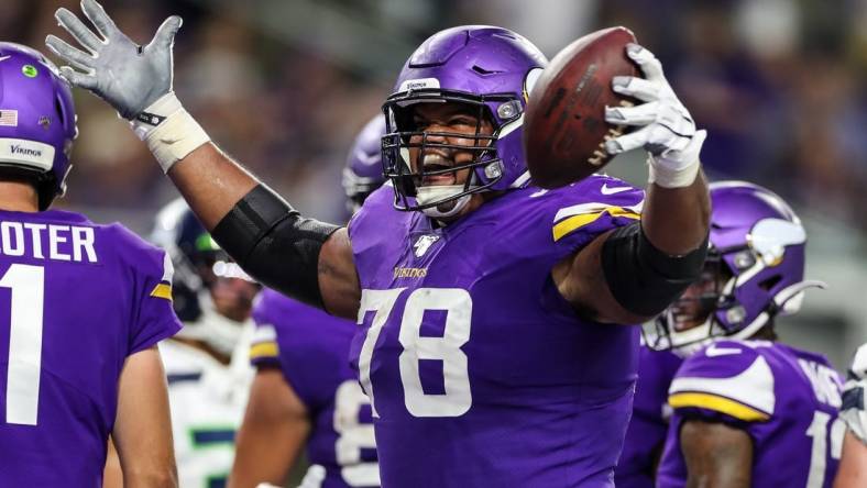 Aug 18, 2019; Minneapolis, MN, USA; Minnesota Vikings offensive lineman Dakota Dozier (78) celebrates a touchdown during the fourth quarter against the Seattle Seahawks at U.S. Bank Stadium. Mandatory Credit: Brace Hemmelgarn-USA TODAY Sports