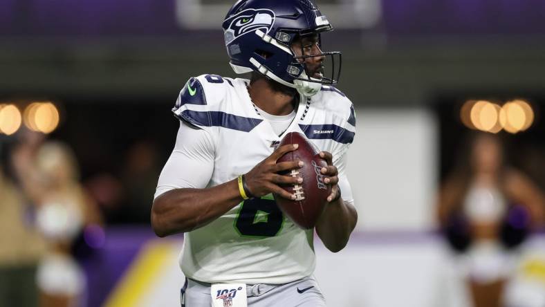 Aug 18, 2019; Minneapolis, MN, USA; Seattle Seahawks quarterback J.T. Barrett (6) throws during the fourth quarter against Minnesota Vikings at U.S. Bank Stadium. Mandatory Credit: Brace Hemmelgarn-USA TODAY Sports