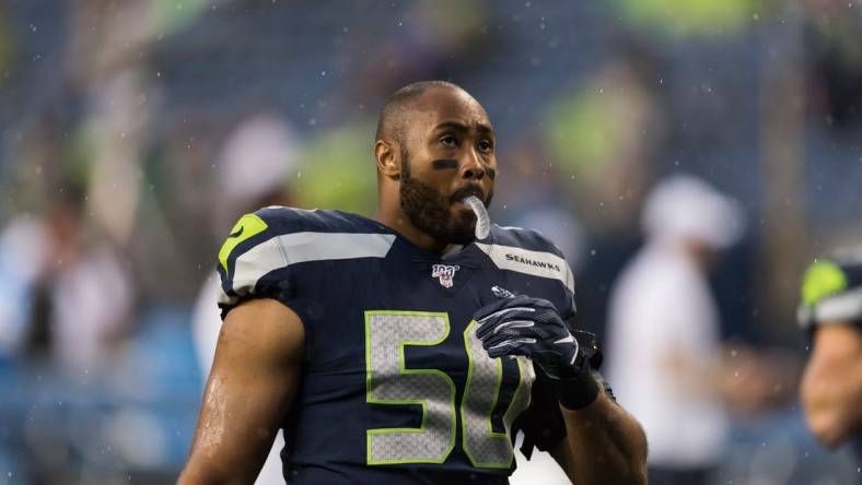 Aug 29, 2019; Seattle, WA, USA; Seattle Seahawks outside linebacker K.J. Wright (50) prior to the game against the Oakland Raiders at CenturyLink Field. Mandatory Credit: Steven Bisig-USA TODAY Sports