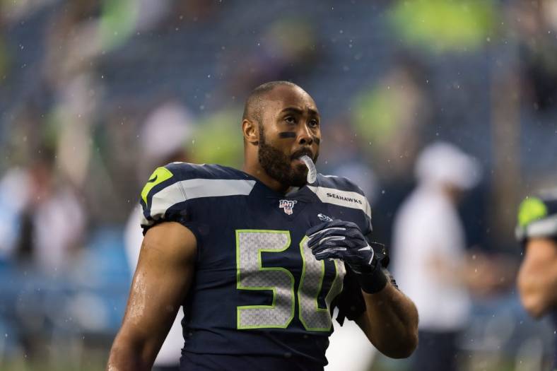 Aug 29, 2019; Seattle, WA, USA; Seattle Seahawks outside linebacker K.J. Wright (50) prior to the game against the Oakland Raiders at CenturyLink Field. Mandatory Credit: Steven Bisig-USA TODAY Sports