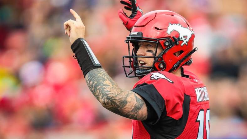 Sep 14, 2019; Calgary, Alberta, CAN; Calgary Stampeders quarterback Bo Levi Mitchell (19) reacts against the Hamilton Tiger-Cats in the first half during a Canadian Football League game at McMahon Stadium. Mandatory Credit: Sergei Belski-USA TODAY Sports