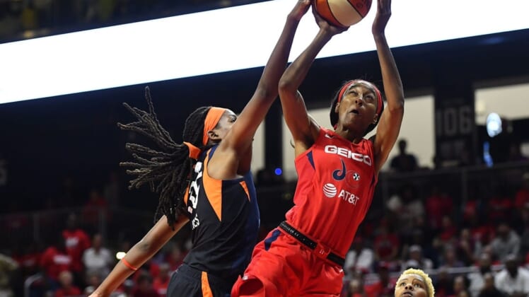 Oct 1, 2019; Washington, DC, USA; Connecticut Sun forward Jonquel Jones (35) blocks the shot by Washington Mystics guard Shatori Walker-Kimbrough (32) during the second quarter in game two of the 2019 WNBA Finals at The Entertainment and Sports Arena. Mandatory Credit: Brad Mills-USA TODAY Sports
