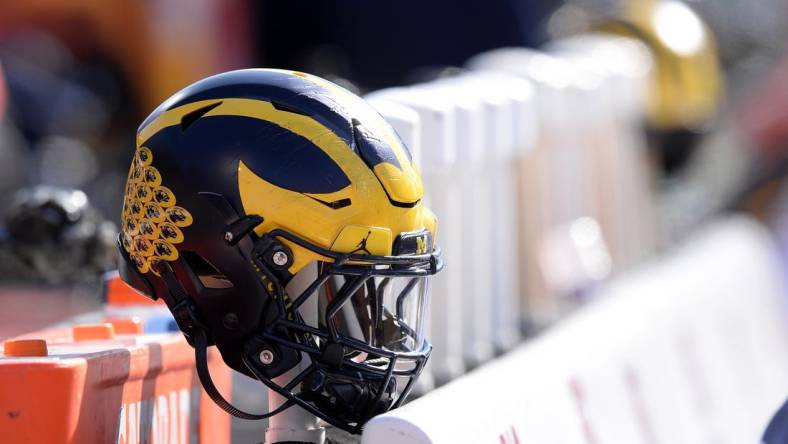 Oct 12, 2019; Champaign, IL, USA; A Michigan Wolverines helmet sits on the back of the bench during the second half of the game against the Illinois Fighting Illini at Memorial Stadium. Mandatory Credit: Michael Allio-USA TODAY Sports