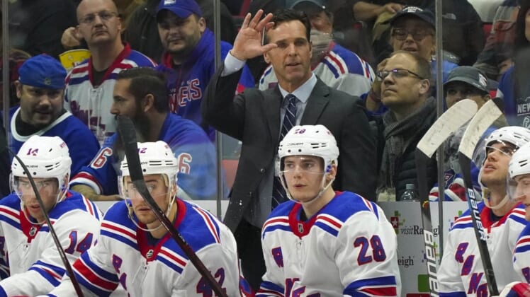 Nov 7, 2019; Raleigh, NC, USA; New York Rangers head coach David Quinn looks on from behind the players bench against the Carolina Hurricanes at PNC Arena. The Rangers won 4-2. Mandatory Credit: James Guillory-USA TODAY Sports