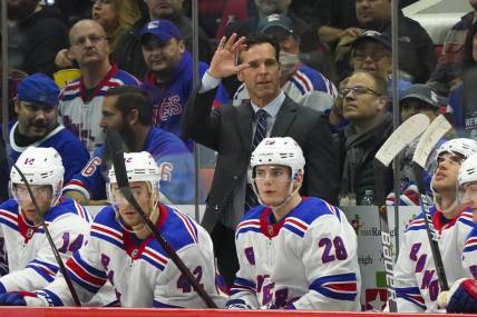 Nov 7, 2019; Raleigh, NC, USA; New York Rangers head coach David Quinn looks on from behind the players bench against the Carolina Hurricanes at PNC Arena. The Rangers won 4-2. Mandatory Credit: James Guillory-USA TODAY Sports