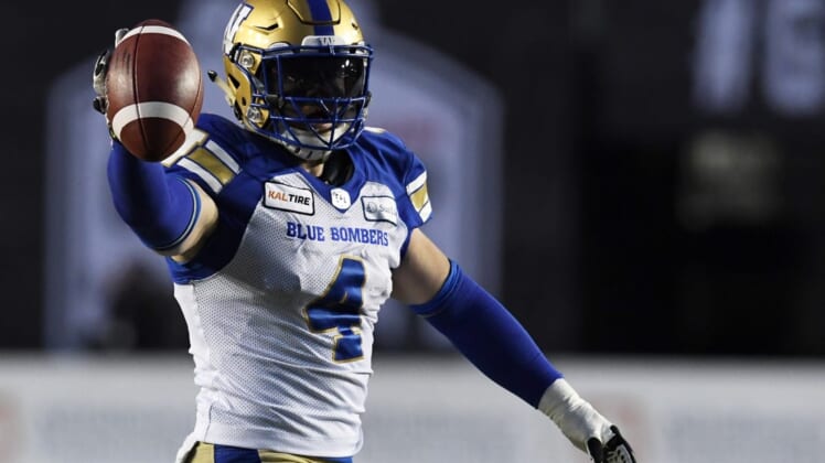 Nov 24, 2019; Calgary, Alberta, CAN; Winnipeg Blue Bombers linebacker Adam Bighill (4) celebrates after recovering a fumble against the Winnipeg Blue Bombers in the first half during the 107th Grey Cup championship football game at McMahon Stadium. Mandatory Credit: Eric Bolte-USA TODAY Sports