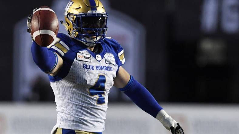 Nov 24, 2019; Calgary, Alberta, CAN; Winnipeg Blue Bombers linebacker Adam Bighill (4) celebrates after recovering a fumble against the Winnipeg Blue Bombers in the first half during the 107th Grey Cup championship football game at McMahon Stadium. Mandatory Credit: Eric Bolte-USA TODAY Sports