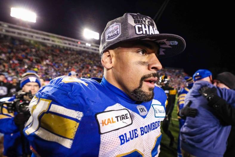 Nov 24, 2019; Calgary, Alberta, CAN; Winnipeg Blue Bombers running back Andrew Harris (33) reacts after the game against the Hamilton Tiger-Cats during the 107th Grey Cup championship football game at McMahon Stadium. Mandatory Credit: Sergei Belski-USA TODAY Sports