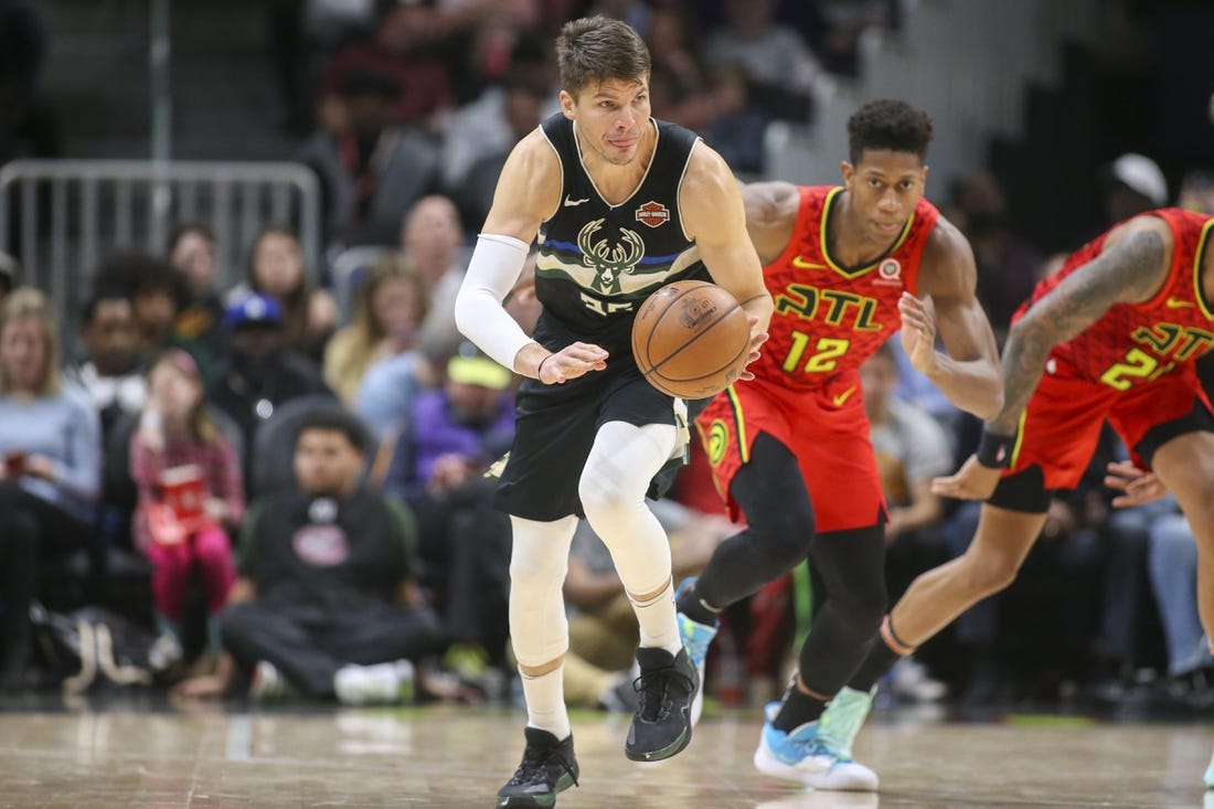 Dec 27, 2019; Atlanta, Georgia, USA; Milwaukee Bucks guard Kyle Korver (26) dribbles the ball against the Atlanta Hawks in the second half at State Farm Arena. Mandatory Credit: Brett Davis-USA TODAY Sports