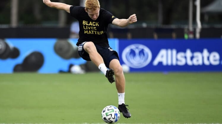 Aug 5, 2020; Orlando, FL, Orlando, FL, USA;  Philadelphia Union midfielder Jack de Vries (14) controls the ball during pregame warmups before their match against the Portland Timbers at ESPN Wide World of Sports Complex. Mandatory Credit: Douglas DeFelice-USA TODAY Sports
