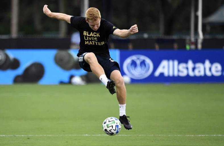 Aug 5, 2020; Orlando, FL, Orlando, FL, USA;  Philadelphia Union midfielder Jack de Vries (14) controls the ball during pregame warmups before their match against the Portland Timbers at ESPN Wide World of Sports Complex. Mandatory Credit: Douglas DeFelice-USA TODAY Sports