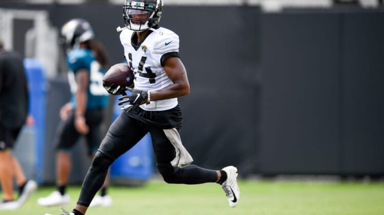 Aug 17, 2020; Jacksonville, Florida, USA; Jacksonville Jaguars wide receiver Terry Godwin (14) runs with the ball during training camp at Dream Finders Homes Practice Complex. Mandatory Credit: Douglas DeFelice-USA TODAY Sports