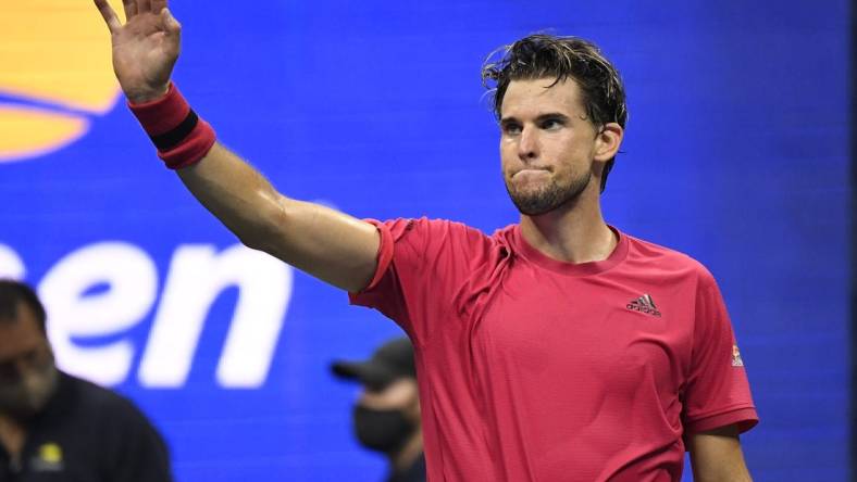 Sep 13 2020; Flushing Meadows, New York, USA; Dominic Thiem of Austria celebrates after his match against Alexander Zverev of Germany (not pictured) in the men's singles final match on day fourteen of the 2020 U.S. Open tennis tournament at USTA Billie Jean King National Tennis Center. Mandatory Credit: Danielle Parhizkaran-USA TODAY Sports