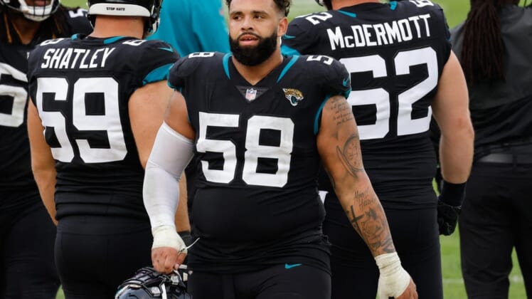 Nov 29, 2020; Jacksonville, Florida, USA;  Jacksonville Jaguars defensive tackle Doug Costin (58) on the bench during the second half against the Cleveland Browns at TIAA Bank Field. Mandatory Credit: Reinhold Matay-USA TODAY Sports
