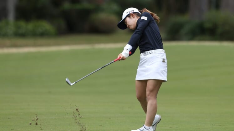 Dec 11, 2020; Houston, Texas, USA; Ayaka Furue hits her approach shot on the fourth hole during the second round of the U.S. Women's Open golf tournament at Champions Golf Club. Mandatory Credit: Thomas Shea-USA TODAY Sports
