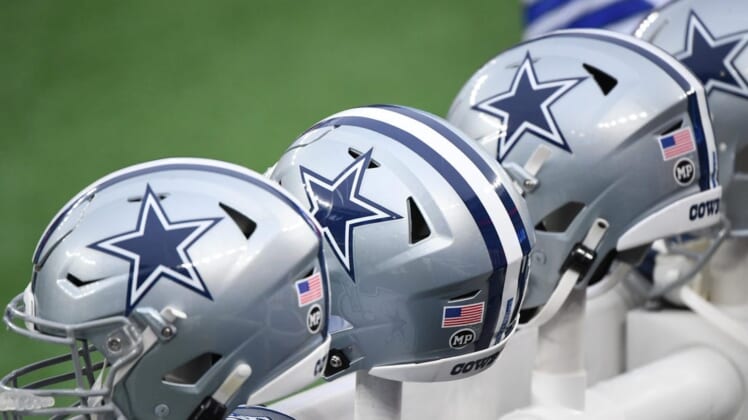 Jan 3, 2021; East Rutherford, NJ, USA; Dallas Cowboys helmets are heated on the benches against the New York Giants in the first half at MetLife Stadium. Mandatory Credit: Robert Deutsch-USA TODAY Sports