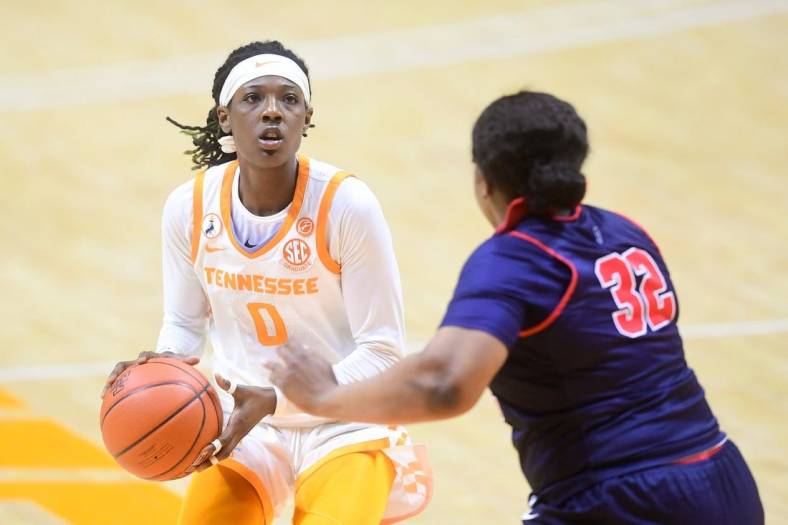 Tennessee guard/forward Rennia Davis (0) looks at the basket while defended by Ole Miss forward Iyanla Kitchens (32) during a basketball game between the Tennessee Lady Vols and the Ole Miss Rebels at Thompson-Boling Arena in Knoxville, Tenn., on Thursday, January 28, 2021.

Syndication The Knoxville News Sentinel