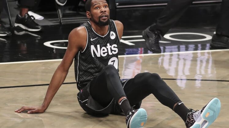 Apr 25, 2021; Brooklyn, New York, USA; Brooklyn Nets forward Kevin Durant (7) looks up after getting fouled in the fourth quarter against the Phoenix Suns at Barclays Center. Mandatory Credit: Wendell Cruz-USA TODAY Sports