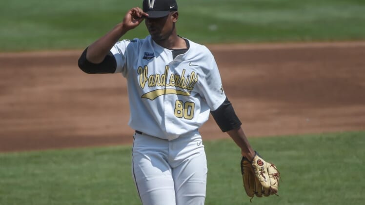 Jun 25, 2021; Omaha, Nebraska, USA; Vanderbilt Commodores starting pitcher Kumar Rocker (80) pitches in the second inning against the NC State Wolfpack at TD Ameritrade Park. Mandatory Credit: Steven Branscombe-USA TODAY Sports