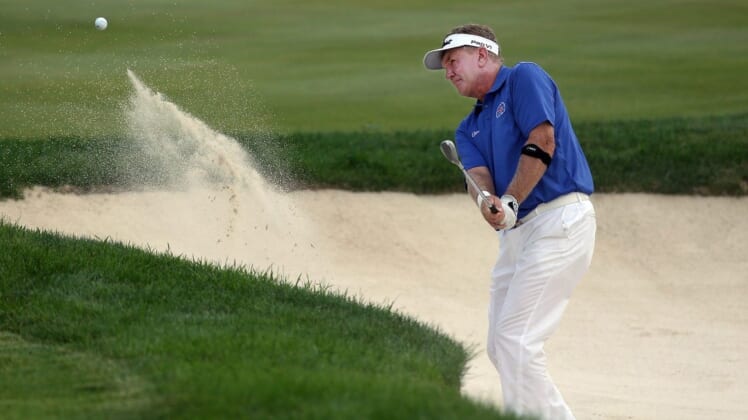 Paul Broadhurst blasts out of the No. 15 bunker during the third round of the Bridgestone Senior Players Championship at Firestone Country Club on Saturday, June 26, 2021, in Akron, Ohio.Bridge R3 8