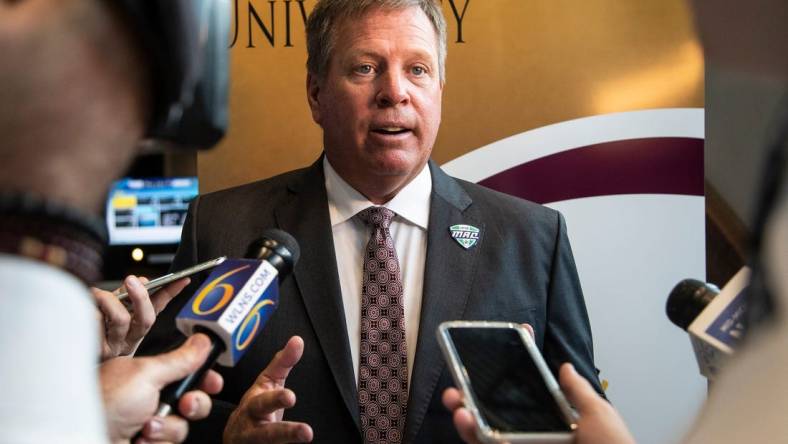 Central Michigan head football coach Jim McElwain talks to reporters during the MAC football media day at Ford Field on Tuesday, July 20, 2021.