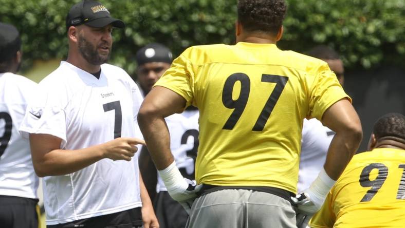 Jul 23, 2021; Pittsburgh, PA, United States;  Pittsburgh Steelers quarterback Ben Roethlisberger (7) talks with defensive tackle Cameron Heyward (97) before drills during training camp at the Rooney UPMC Sports Performance Complex. Mandatory Credit: Charles LeClaire-USA TODAY Sports