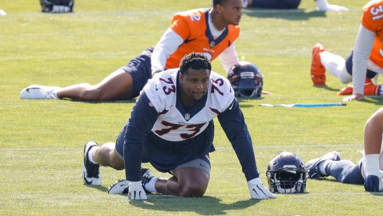 Jul 29, 2021; Englewood, CO, United States; Denver Broncos tackle Cam Fleming (73) during training camp at UCHealth Training Center. Mandatory Credit: Isaiah J. Downing-USA TODAY Sports