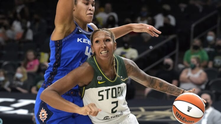 Aug 12, 2021; Phoenix, Arizona, USA; Seattle Storm center Mercedes Russell (2) drives against Connecticut Sun forward Brionna Jones (42) in the first half during the Inaugural WNBA Commissioners Cup Championship Game at Footprint Center. Mandatory Credit: Rick Scuteri-USA TODAY Sports
