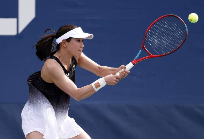 Aug 31, 2021; Flushing, NY, USA;  Nao Hibino of Japan in action against Fiona Ferro of France in a first round match on day two of the 2021 U.S. Open tennis tournament at USTA Billie King National Tennis Center. Mandatory Credit: Jerry Lai-USA TODAY Sports