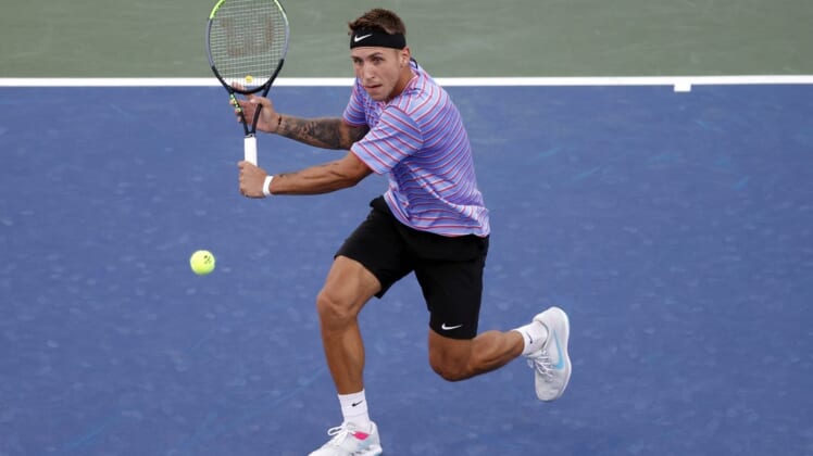 Sep 3, 2021; Flushing, NY, USA; Alex Molcan of Slovakia hits a shot against Diego Schwartzman of Argentina in a third round match on day five of the 2021 U.S. Open tennis tournament at USTA Billie Jean King National Tennis Center. Mandatory Credit: Jerry Lai-USA TODAY Sports