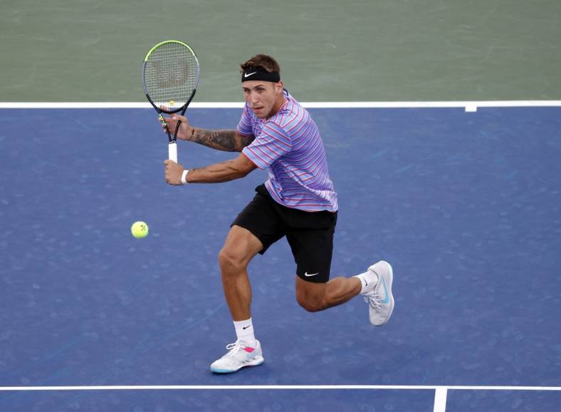 Sep 3, 2021; Flushing, NY, USA; Alex Molcan of Slovakia hits a shot against Diego Schwartzman of Argentina in a third round match on day five of the 2021 U.S. Open tennis tournament at USTA Billie Jean King National Tennis Center. Mandatory Credit: Jerry Lai-USA TODAY Sports