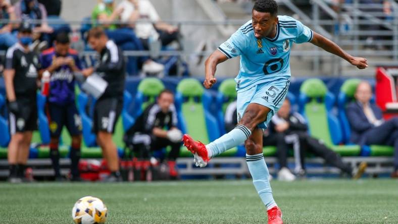 Sep 11, 2021; Seattle, Washington, USA; Minnesota United FC midfielder Jacori Hayes (5) attempts a shot against the Seattle Sounders FC during the second half at CenturyLink Field. Mandatory Credit: Joe Nicholson-USA TODAY Sports