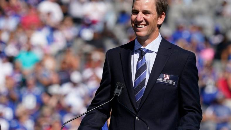 Sep 26, 2021; E. Rutherford, N.J., USA;  New York Giants former quarterback Eli Manning is honored at halftime of the game between Atlanta Falcons and the Giants at MetLife Stadium. Mandatory Credit: Robert Deutsch-USA TODAY Sports