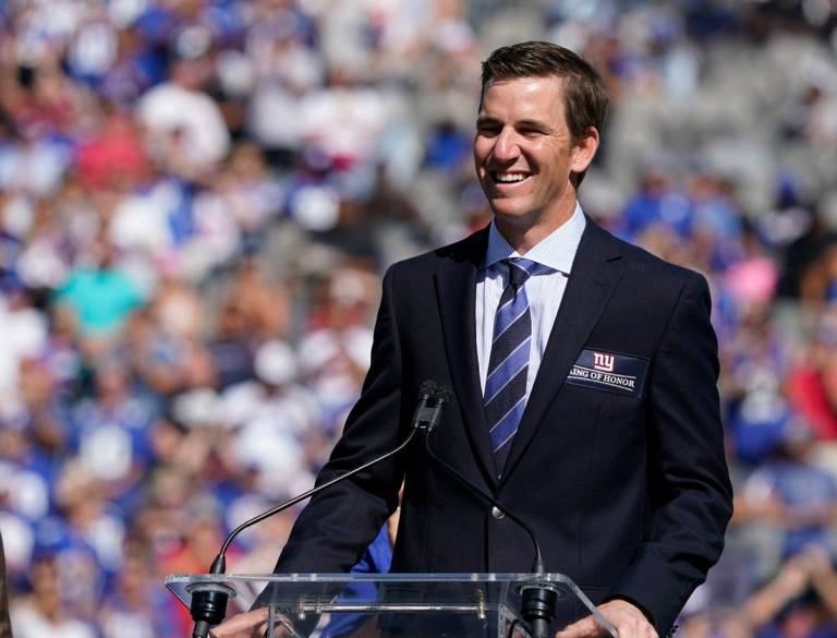 Sep 26, 2021; E. Rutherford, N.J., USA;  New York Giants former quarterback Eli Manning is honored at halftime of the game between Atlanta Falcons and the Giants at MetLife Stadium. Mandatory Credit: Robert Deutsch-USA TODAY Sports