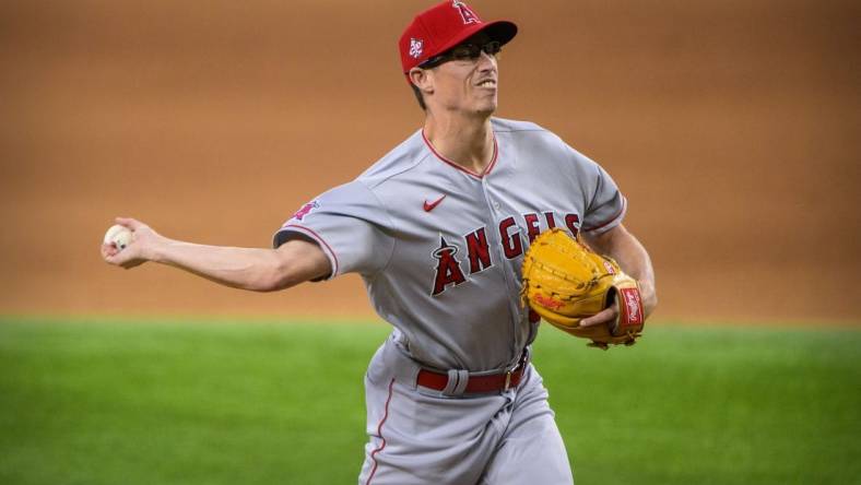 Sep 30, 2021; Arlington, Texas, USA; Los Angeles Angels relief pitcher Jimmy Herget (46) pitches against the Texas Rangers during the eighth inning at Globe Life Field. Mandatory Credit: Jerome Miron-USA TODAY Sports