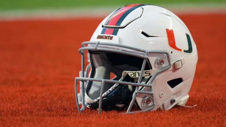 Sep 30, 2021; Miami Gardens, Florida, USA; A general view of a Miami Hurricanes helmet in the end zone prior to the game between the Miami Hurricanes and the Virginia Cavaliers at Hard Rock Stadium. Mandatory Credit: Jasen Vinlove-USA TODAY Sports