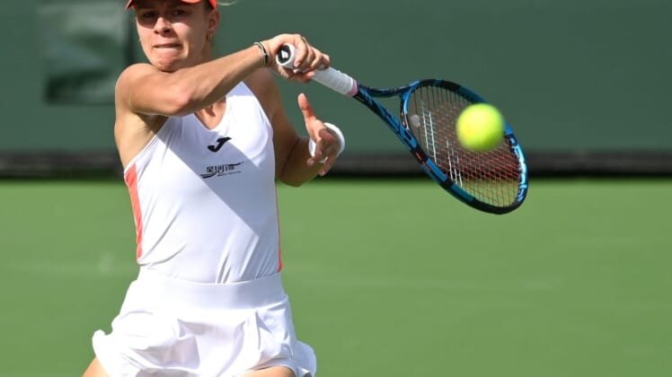 Oct 6, 2021; Indian Wells, CA, USA; Magda Linette (POL) hits a shot during her first round match against  Rebecca Peterson (not pictured) in the BNP Paribas Open at the Indian Wells Tennis Garden. Mandatory Credit: Jayne Kamin-Oncea-USA TODAY Sports