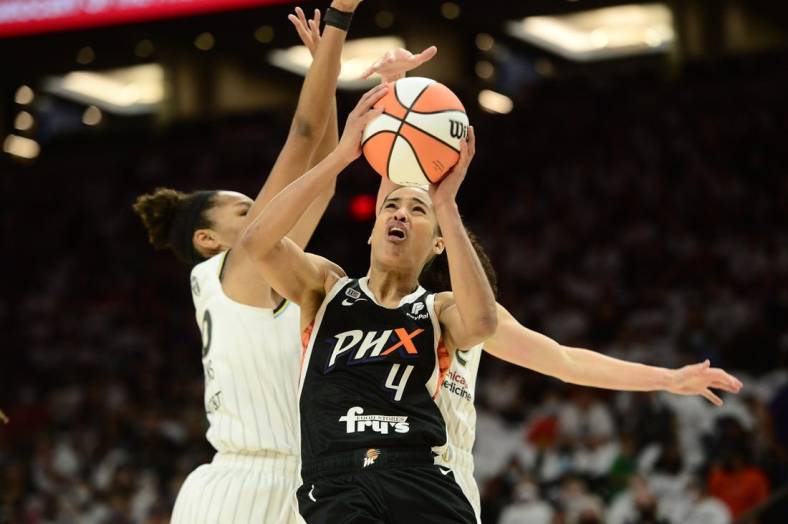 Oct 10, 2021; Phoenix, Arizona, USA; Phoenix Mercury guard Skylar Diggins-Smith (4) shoots against the Chicago Sky during the first half of game one of the 2021 WNBA Finals at Footprint Center. Mandatory Credit: Joe Camporeale-USA TODAY Sports
