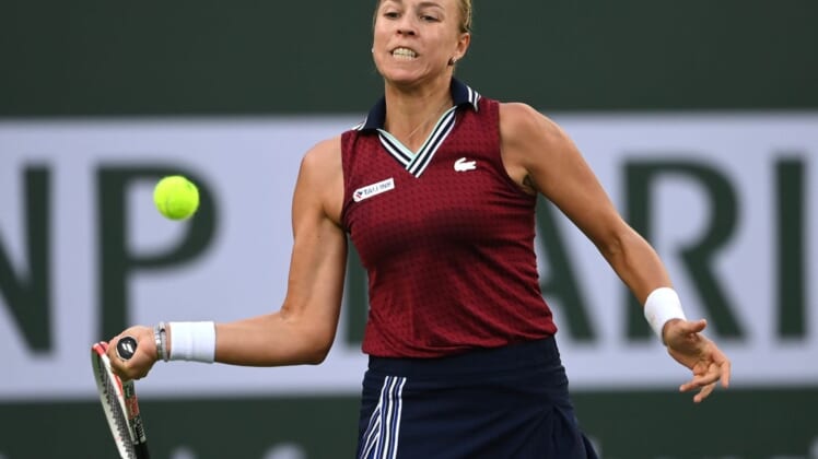 Oct 14, 2021; Indian Wells, CA, USA; Anett Kontaveit (EST) hits a shot against Ons Jabeur (TUN) in their quarterfinal match during the BNP Paribas Open at the Indian Wells Tennis Garden. Mandatory Credit: Jayne Kamin-Oncea-USA TODAY Sports