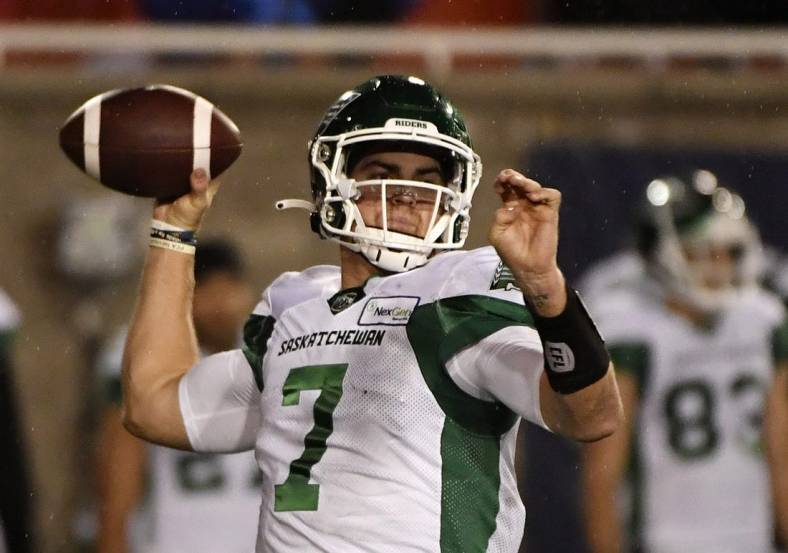 Oct 30, 2021; Montreal, Quebec, CAN; Saskatchewan Roughriders quarterback Cody Fajardo (7) throws a pass against the Montreal Alouettes in the fourth quarter during a Canadian Football League game at Molson Field. Mandatory Credit: Eric Bolte-USA TODAY Sports