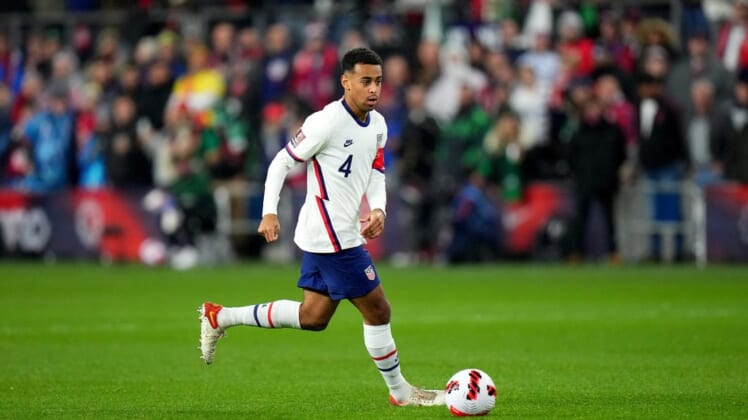 Tyler Adams #4 of the United States maintains possession during the first half of a 2022 World Cup CONCACAF qualifying match against Mexico, Friday, Nov. 12, 2021, at TQL Stadium in Cincinnati. United States won against Mexico, 2-0.Mexico At Usa 2022 World Cup Qualifier Nov 11