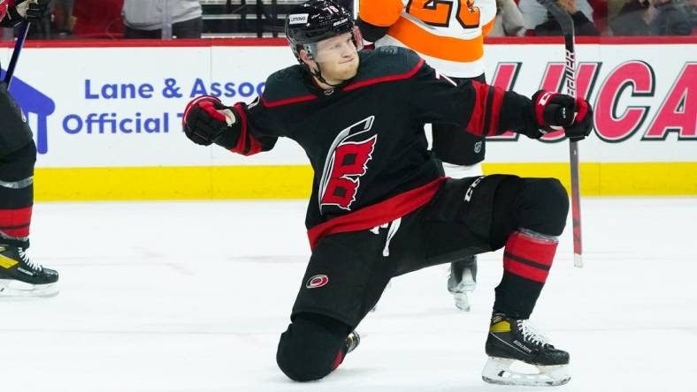 Nov 12, 2021; Raleigh, North Carolina, USA;  Carolina Hurricanes center Steven Lorentz (78) celebrates his second period goal against the Philadelphia Flyers at PNC Arena. Mandatory Credit: James Guillory-USA TODAY Sports