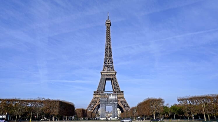 Nov 198, 2021; Paris, France; A view of the Eiffel Tower from the Champ de Mars which will server as the venue for beach volleyball during the Paris 2024 Olympics. Mandatory Credit: Peter Casey-USA TODAY Sports
