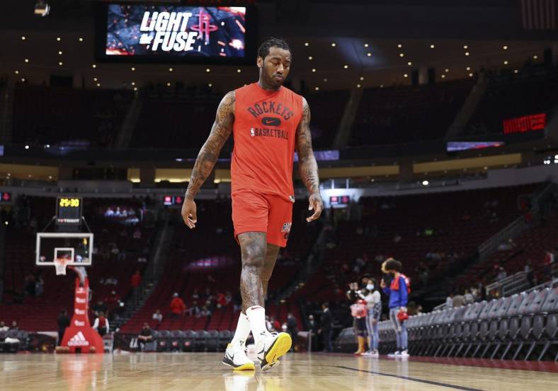 Nov 24, 2021; Houston, Texas, USA; Houston Rockets guard John Wall (1) walks on the court before the game against the Chicago Bulls at Toyota Center. Mandatory Credit: Troy Taormina-USA TODAY Sports