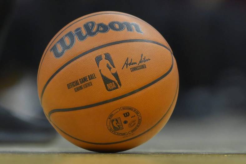 Dec 8, 2021; Cleveland, Ohio, USA; A general view of an NBA game ball on the court in the third quarter of a game between the Cleveland Cavaliers and the Chicago Bulls at Rocket Mortgage FieldHouse. Mandatory Credit: David Richard-USA TODAY Sports