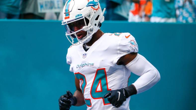 Dec 5, 2021; Miami Gardens, Florida, USA; Miami Dolphins cornerback Byron Jones (24) takes on the field prior the game against the New York Giants at Hard Rock Stadium. Mandatory Credit: Sam Navarro-USA TODAY Sports