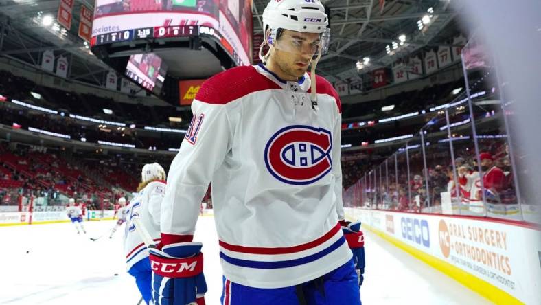 Dec 30, 2021; Raleigh, North Carolina, USA;  Montreal Canadiens left wing Brandon Baddock (81) against the Carolina Hurricanes before the game at PNC Arena. Mandatory Credit: James Guillory-USA TODAY Sports